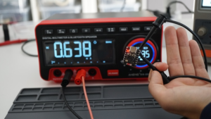 ESP32-C3 board connected to a lithium battery for low power testing